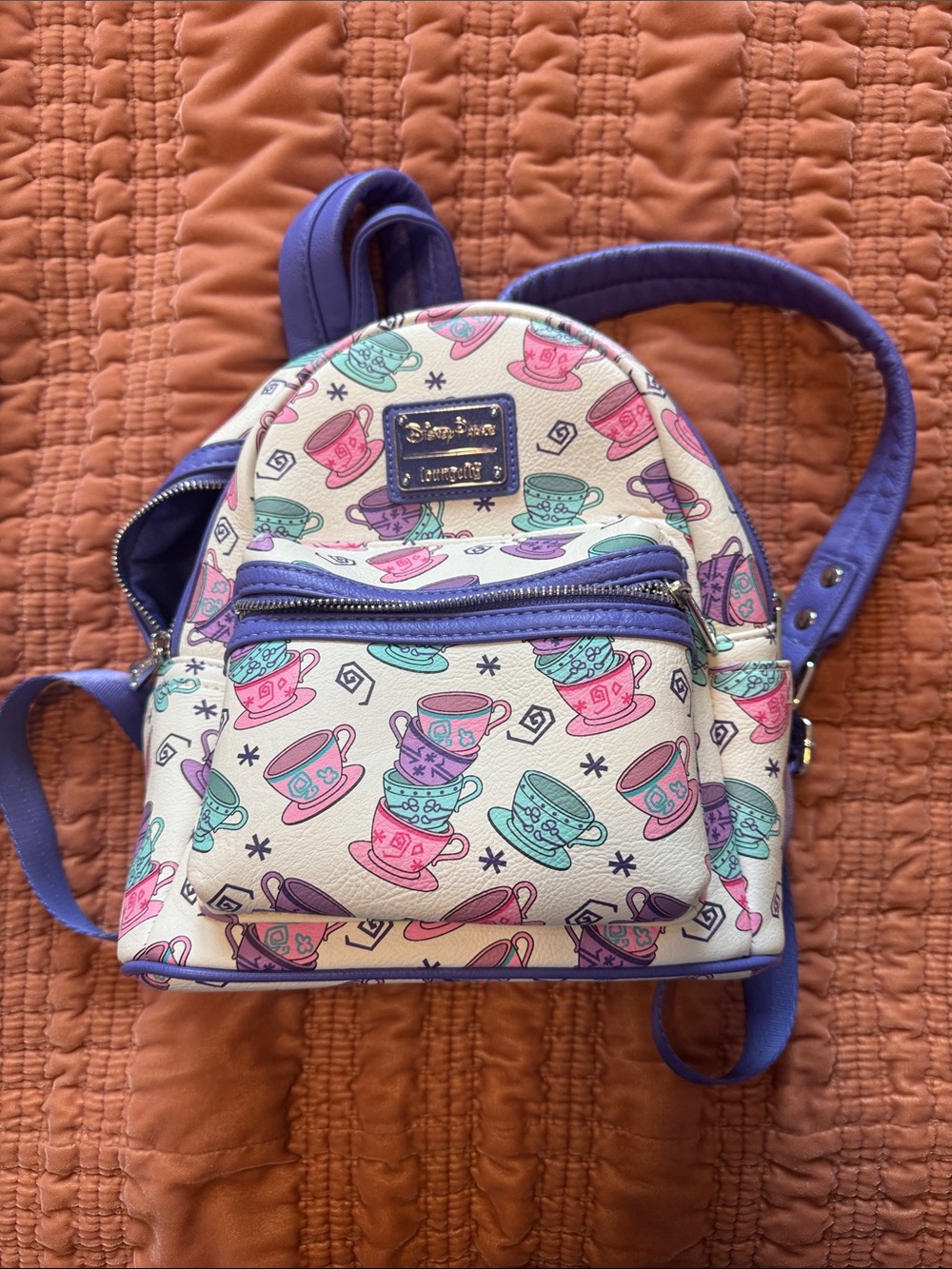 Loungefly Kids Mini Backpack in White with Purple, Pink, and Teal Teacup Print